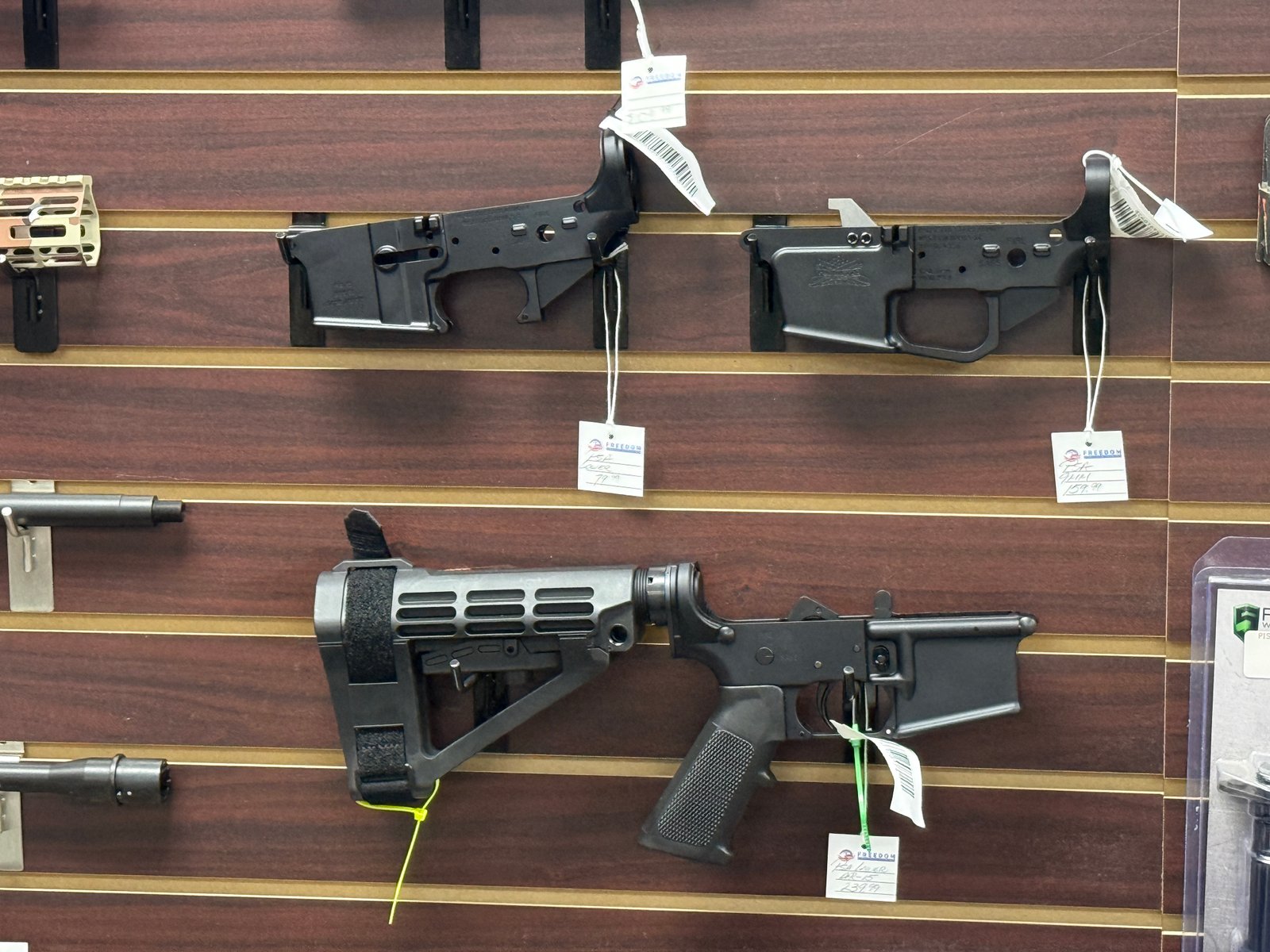 AR-15 lowers and pistol brace on display